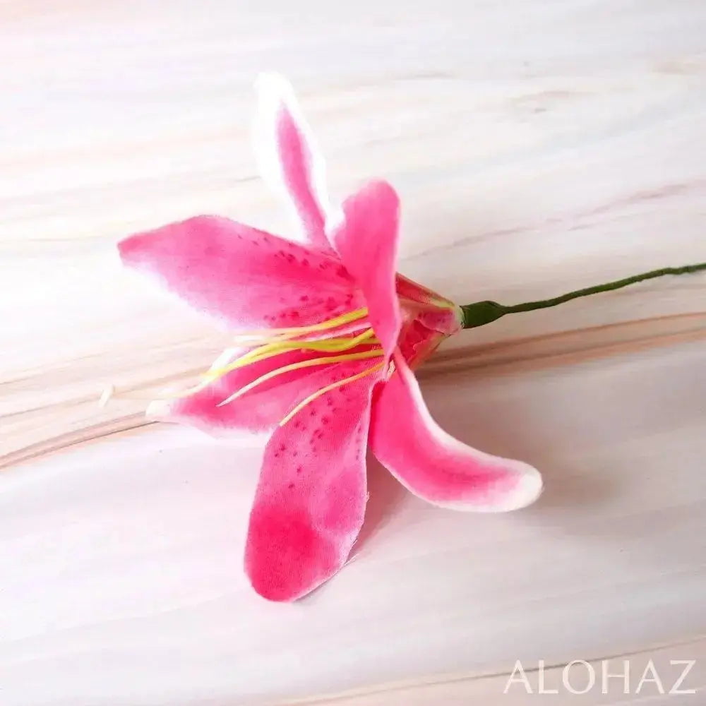 Magenta pink lily hawaiian flower stick