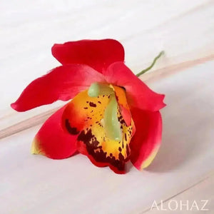 Red cattleya hawaiian flower stick